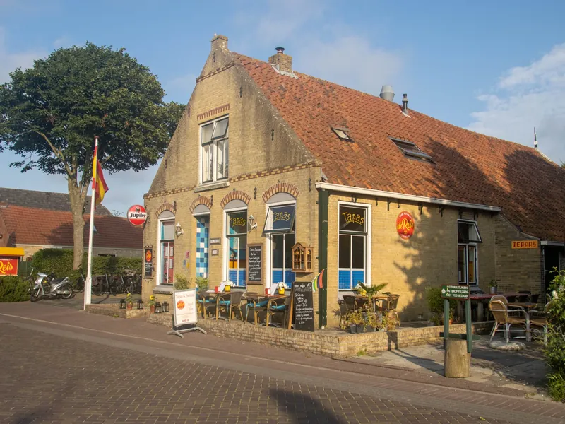 A restaurant with a terrace in an old building in Hoorn